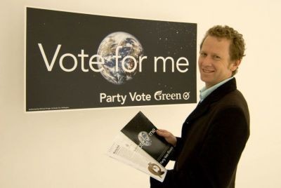 Russell Norman with the new Green Party campaign posters